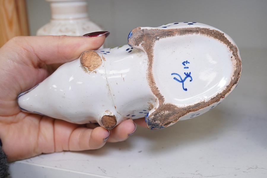 A faience ‘pig’ money bank, and two early 19th century painted lidded jars. Condition - poor, damage to pig.